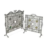 Two similar wrought iron fire guards, circa 1900,