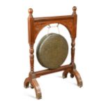 A late Victorian mahogany dinner gong and mallet,