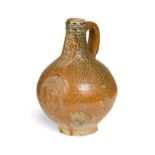 A German stoneware armorial Bartmann jug or Bellarmine, 17th century,