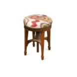 A mahogany piano stool upholstered in Uzbek fabric, early 19th century,