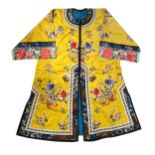 A Chinese yellow satin silk woman's jacket, Qing Dynasty, late 19th/early 20th century,