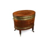 A George III mahogany and brass bound oval wine cooler,