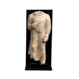 A Gandharan large stucco torso of a Buddhist follower, 3rd-5th century,