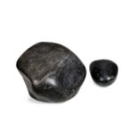 A Chinese scholar's polished black stone boulder, 19th/20th century,