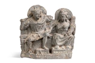 A Gandharan grey schist figure group, 2nd-4th century,