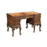 A Chippendale style carved mahogany pedestal desk, late 19th century,