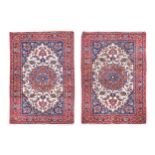 A pair of finely-woven Kerman rugs, circa 1930,