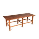 A large Philippine teak two plank top dining table, late 19th/early 20th century,
