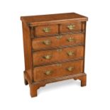 A George I style walnut bachelor's chest, 20th century,