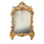 A shaped gilt wall mirror, late 18th century,