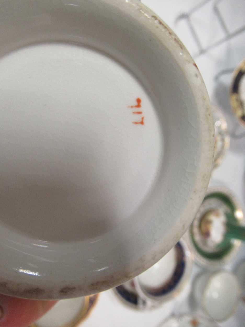 A collection of porcelain and bone china including a Derby coffee can painted with lake of Kilarney, - Bild 8 aus 35