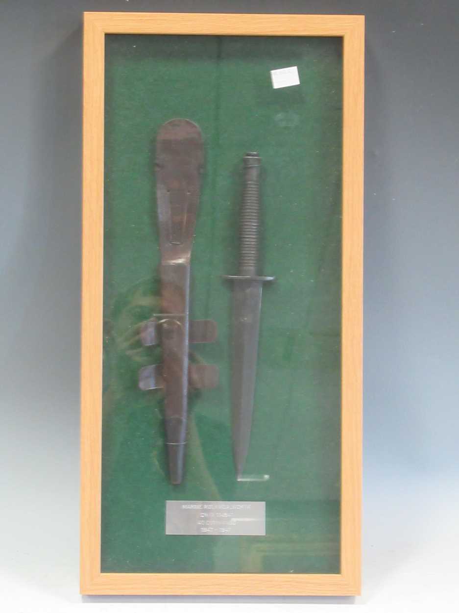 A framed Fairbairn Sykes Commando dagger, 53 x 26cm