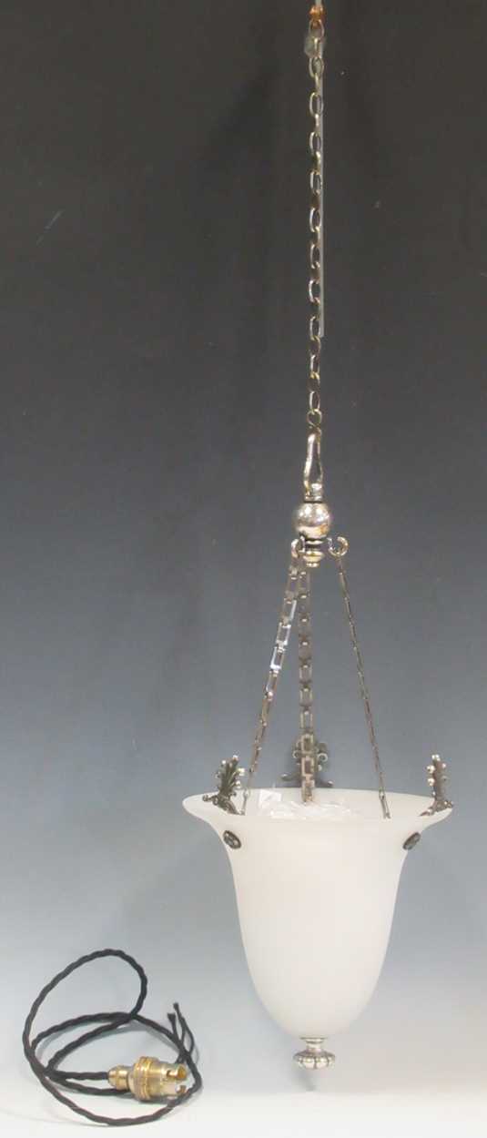 An Edwardian opaque glass ceiling light, supported on three chains