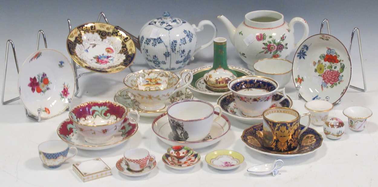 A collection of porcelain and bone china including a Derby coffee can painted with lake of Kilarney,