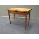 A 19th century mahogany foldover tea table, 73 x 89 x 45cm (closed) 71 x 89 x 89.5cm (open)