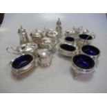 4 sets of three piece silver cruets, together with a pair of silver salts and a silver mustard