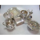 Three silver sugar bowls and two silver cream jugs, together with 4 silver napkin rings, two pairs