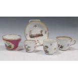A Meissen cup, another smaller cup together with a cup and saucer painted with figures in a