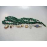 three rows of malachite beads, a hallmarked 9ct gold locket and an opal ring stamped '10K', gross