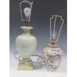 A green glazed ceramic balluster lamp together with another ceramic lamp in imari pallette,
