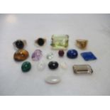 A group of gemstones, together with a hallmarked 9ct gold ring weight 4.9g, a ring stamped '14K'