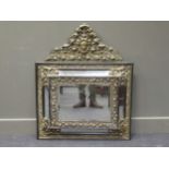 A Dutch 19th century pressed brass, cushion framed wall mirror, 100 x 80cm