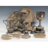 A silver backed brush set together with a quantity of miscellanious items and small silver trophy