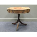 A Regency style mahogany drum table, 69cm high and 67.5cm diameter
