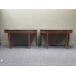 A pair of 19th century mahogany D-end tables with later green marble tops 73 x 129 x 63cm