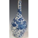 A blue and white vase decorated with a dragon and blossoms, 40cm