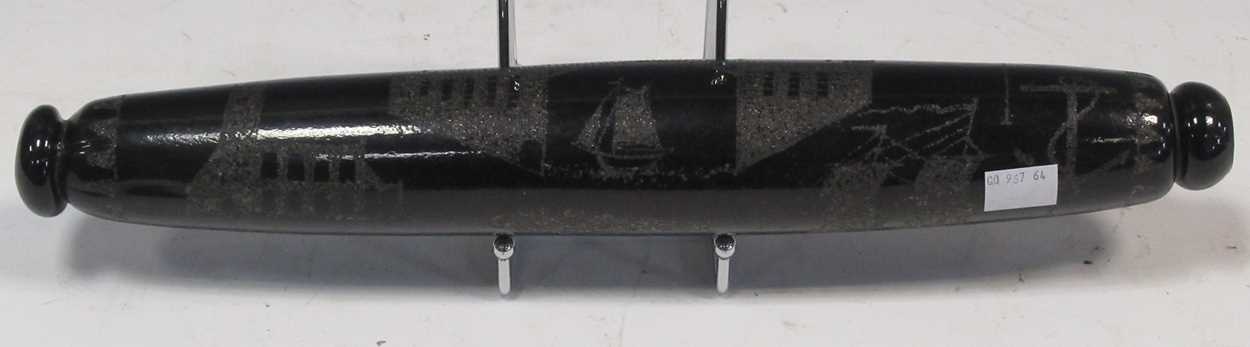 A Victorian dark glass 'Sunderland Bridge' rolling pin, marked 'ANN', with naieve style scratched