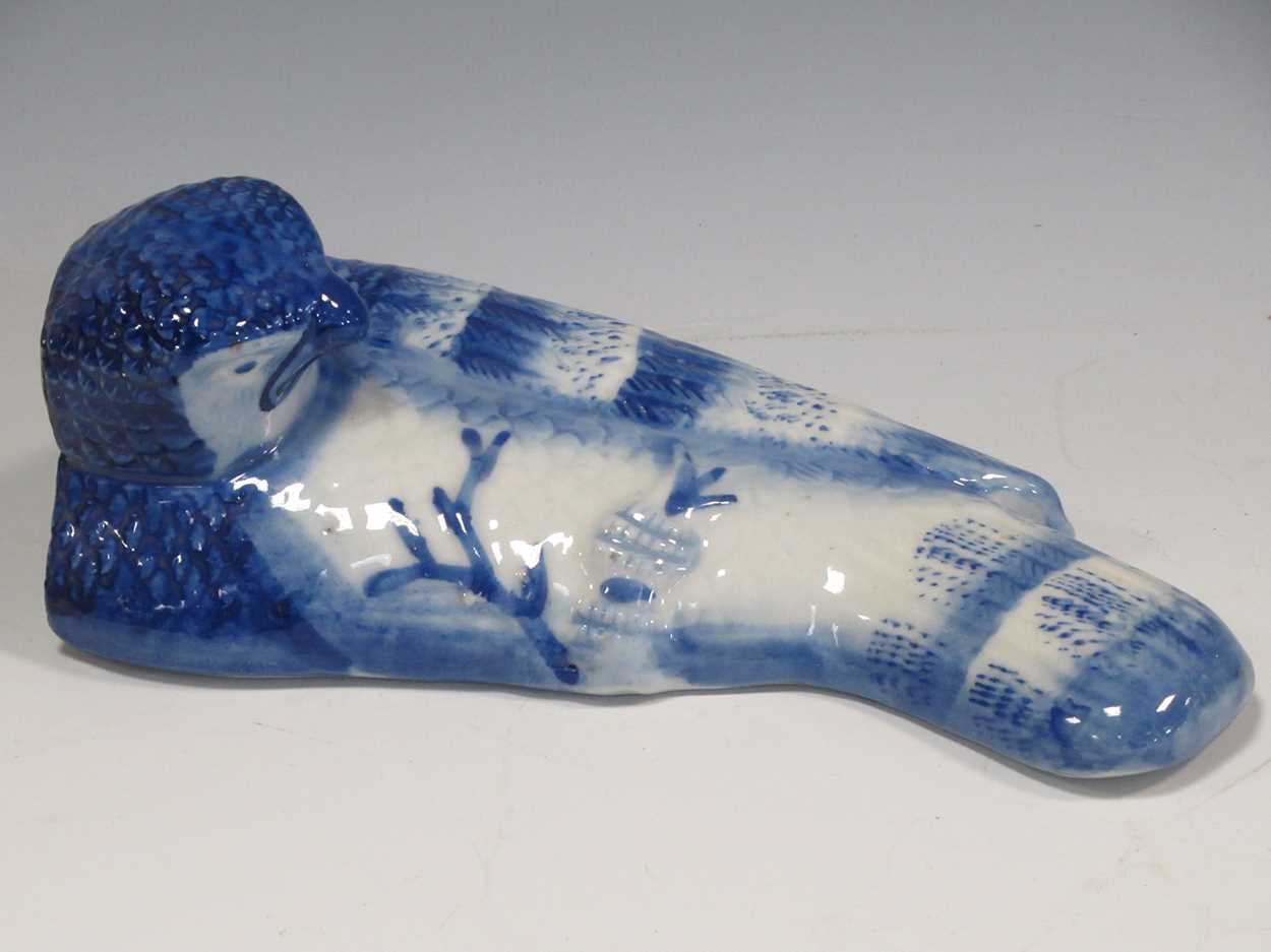 A blue and white ceramic flatback bird, 22cm