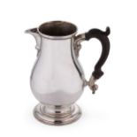 A George III 18th century silver beer jug,