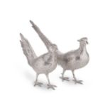 A brace of early 20th century German metalwares silver pheasants,