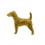 A dog brooch,