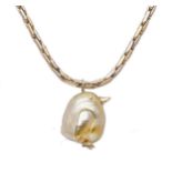 An Indonesian cultured baroque pearl pendant and chain,