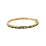 A sapphire and diamond child's bangle,