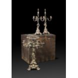 A Victorian silver plated table centrepiece with a pair of candelabra and fitted travelling trunk,