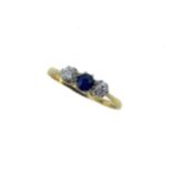 A sapphire and diamond three stone ring,