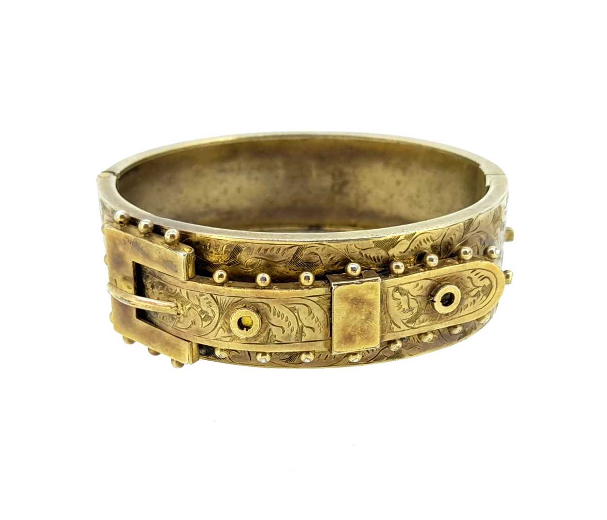 A Victorian silver gilt buckle bangle,