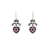 A pair of ruby and diamond heart shaped ear pendants,