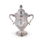 An early George III 18th century silver two handled cup and cover,