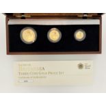 The Royal Mint Britannia gold three-coin set 2012 (wooden boxed), containing £50 (half ounce), £