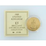 1989 United Kingdom £5 brilliant uncirculated 22ct gold coin, 39.94g, with certificate no. 01180,