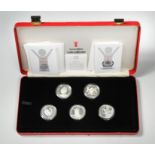 Save the Children Coin Collection, 24 (of 25) silver proof crown type coins, in worn case, with