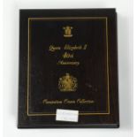 Queen Elizabeth II 40th Anniversary Coronation Crown Collection wooden case comprising eighteen