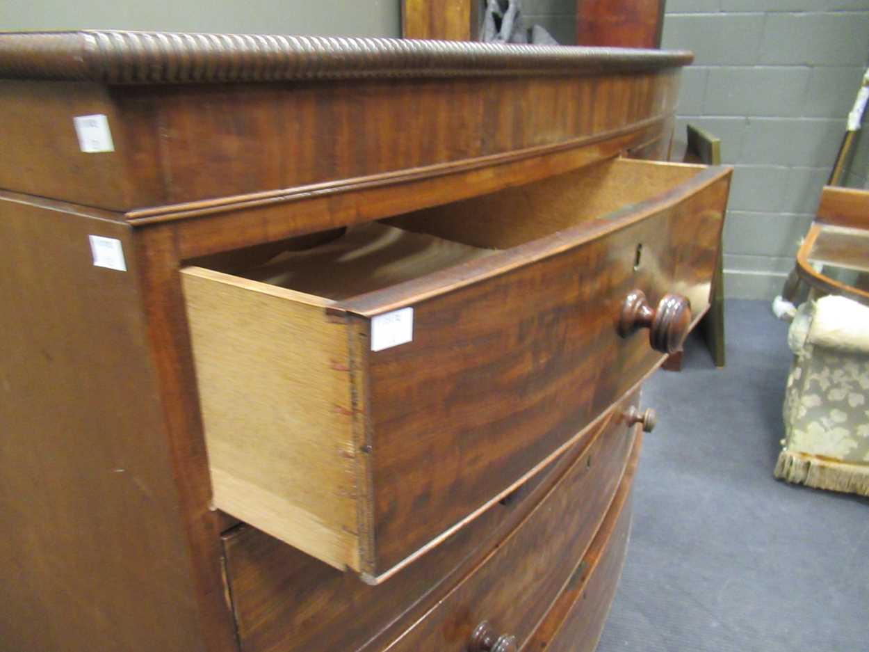 A Victorian bow fronted chest of drawers, with two short over three graduating long drawers, with - Image 4 of 9