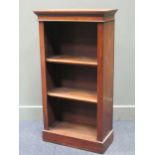 A 20th century mahogany open bookcase with adjustable shelves on a plinth base, 109 x 59 x 27cm