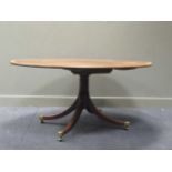 A Regency mahogany breakfast table with crossbanded oval top, 71 x 151 x 120cm