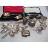 A collection of silver, mainly flatware, together with napkin rings, cruets etc 23.7ozt gross